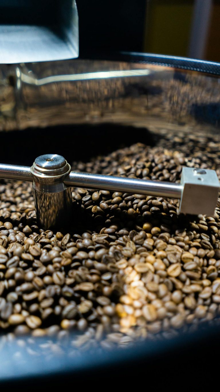 Close-up of coffee beans in a roasting machine from Cirebon, Indonesia.